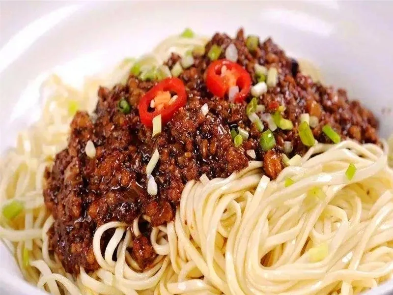 Zha Jiang Mian served with cucumber and bean sprouts