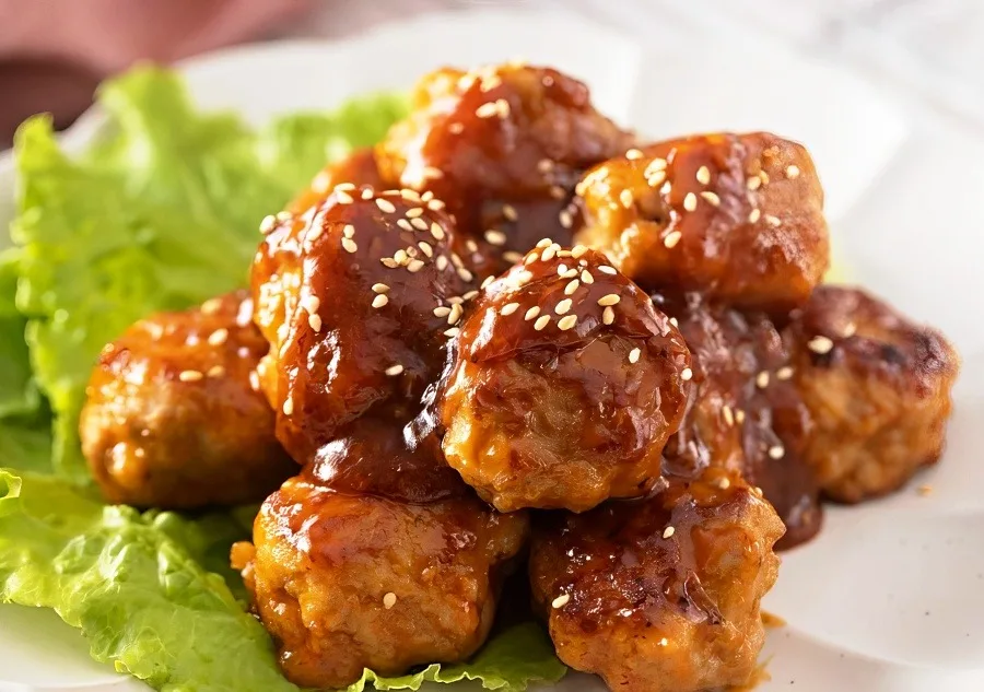 Chinese pork meatballs in sweet and sour sauce