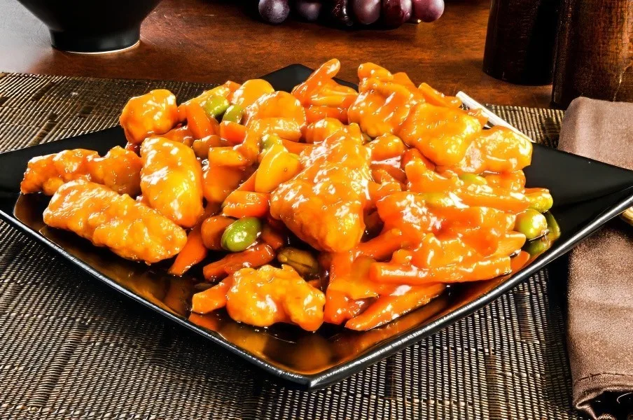 Crispy orange chicken in a glossy sauce