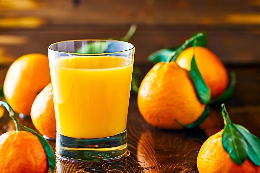 Fresh orange juice and oranges