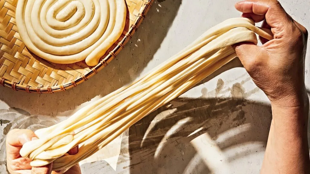 Making longevity noodles by hand