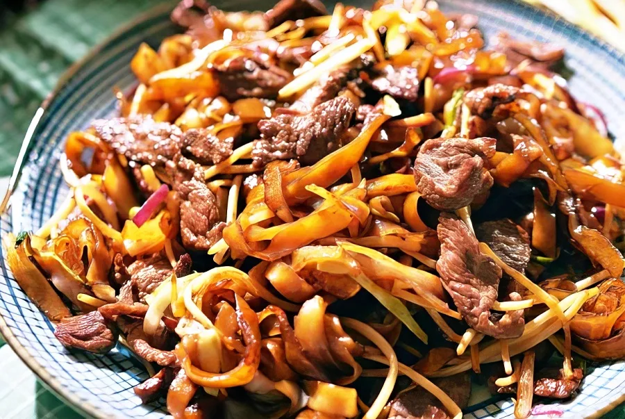 Stir-fried ho fun rice noodles