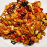 Kung pao chicken in a wok