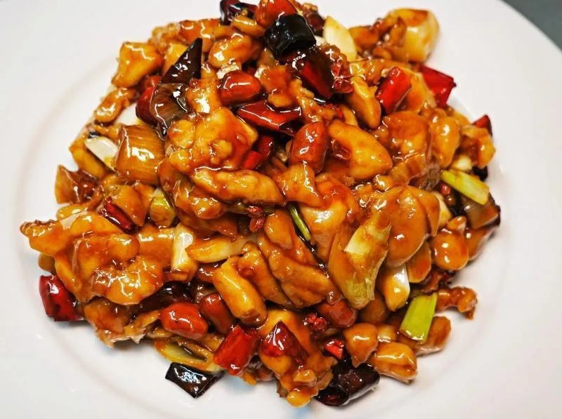 Kung pao chicken in a wok