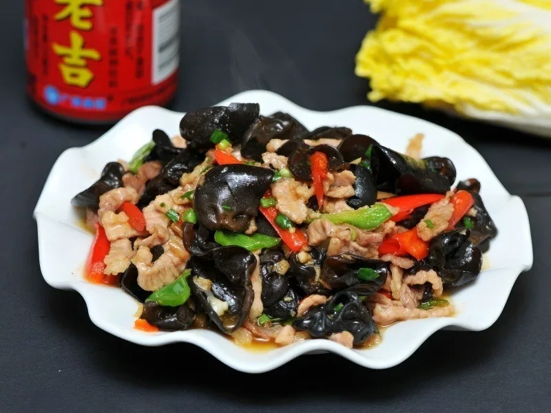 Pork with wood ear mushrooms served with rice