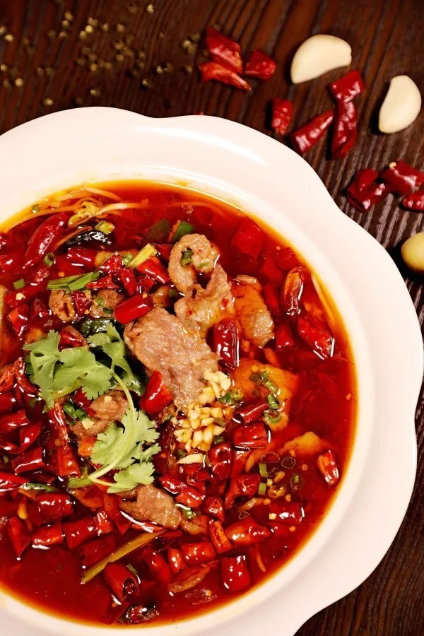Sichuan boiled beef topped with dried chilies