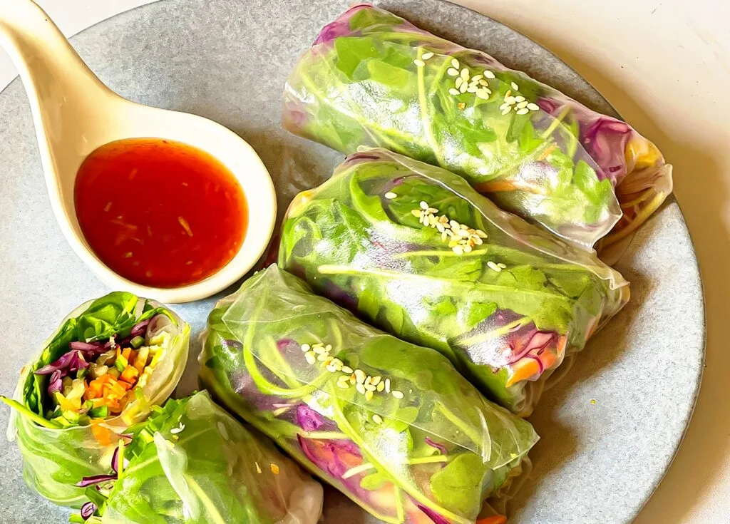 Spring rolls with plum sauce for dipping