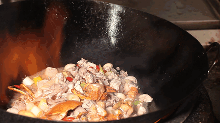 Stir-frying in a wok