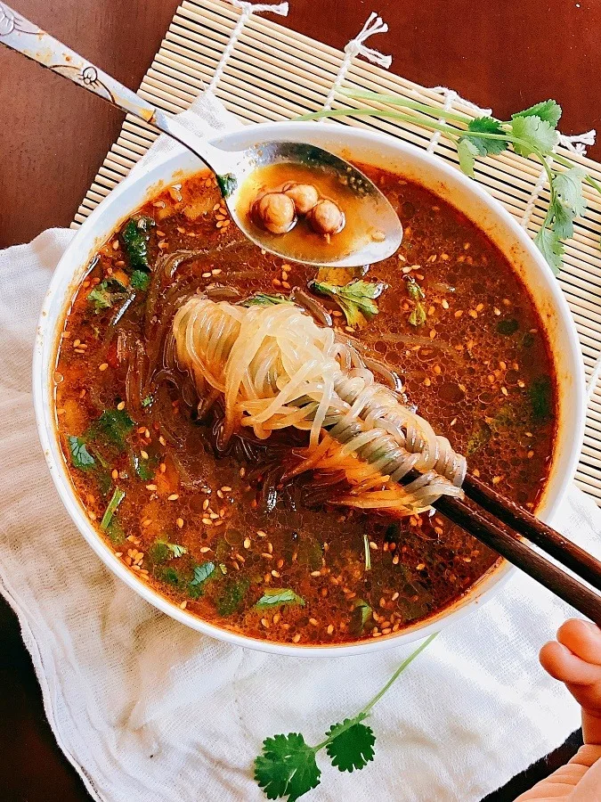 Bowl of hot and sour sweet potato noodles